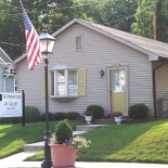 store building with a flag